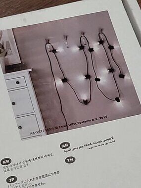 SVARTRÅ  805.218.07/80521807 LED string light with 12 lights, black/outdoor